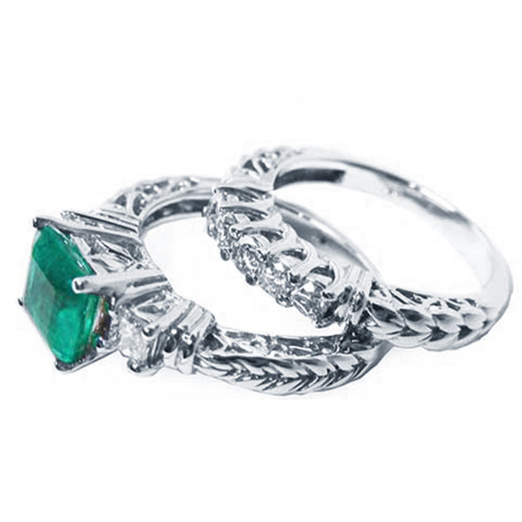 Colombian Emerald engagement ring natural Muzo mine of 1.48 carats, paired with a coordinating diamond wedding band. Both crafted in 14K white gold