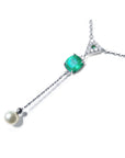 1.91 carat emerald cushion cut necklace with a hanging freshwater pearl and diamond cluster, 14K white gold.