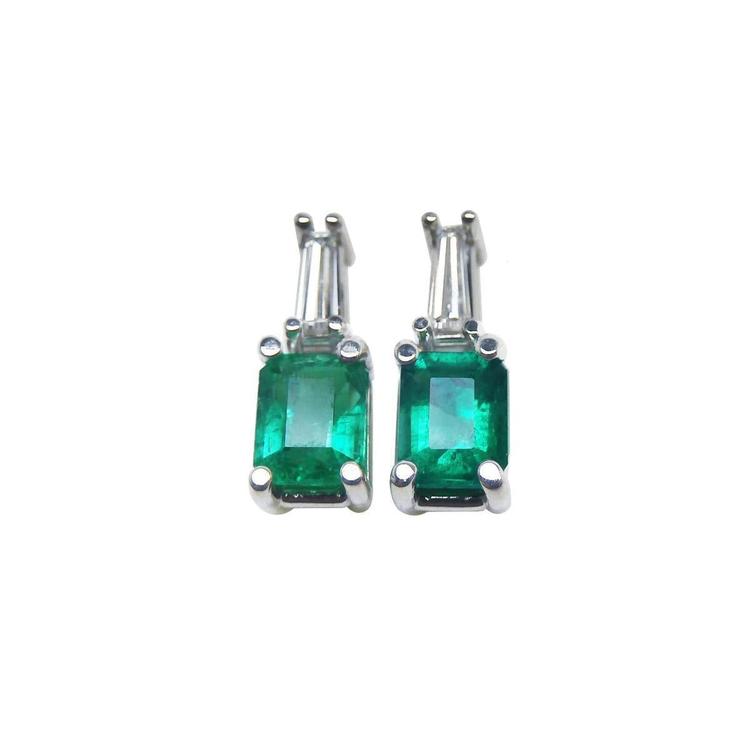Emerald and baguette diamond earrings, 14 white gold, front side position top view.