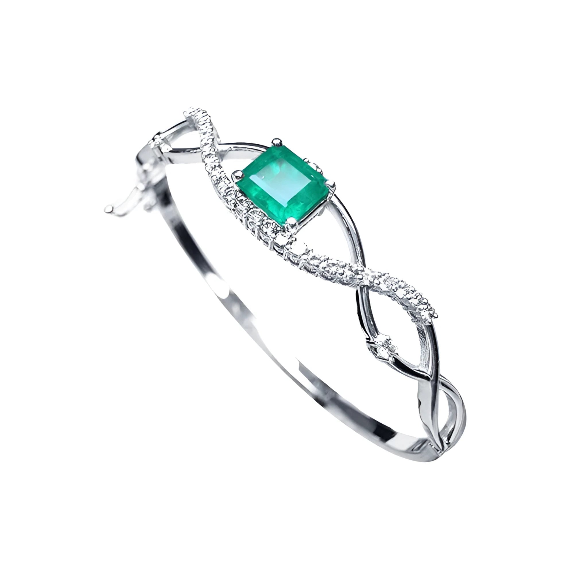 14K white gold bangle with a central emerald-cut emerald and entwined diamond strips.