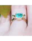 A yellow gold colombian emerald ring bezel set crafted in solid 14k yellow gold.