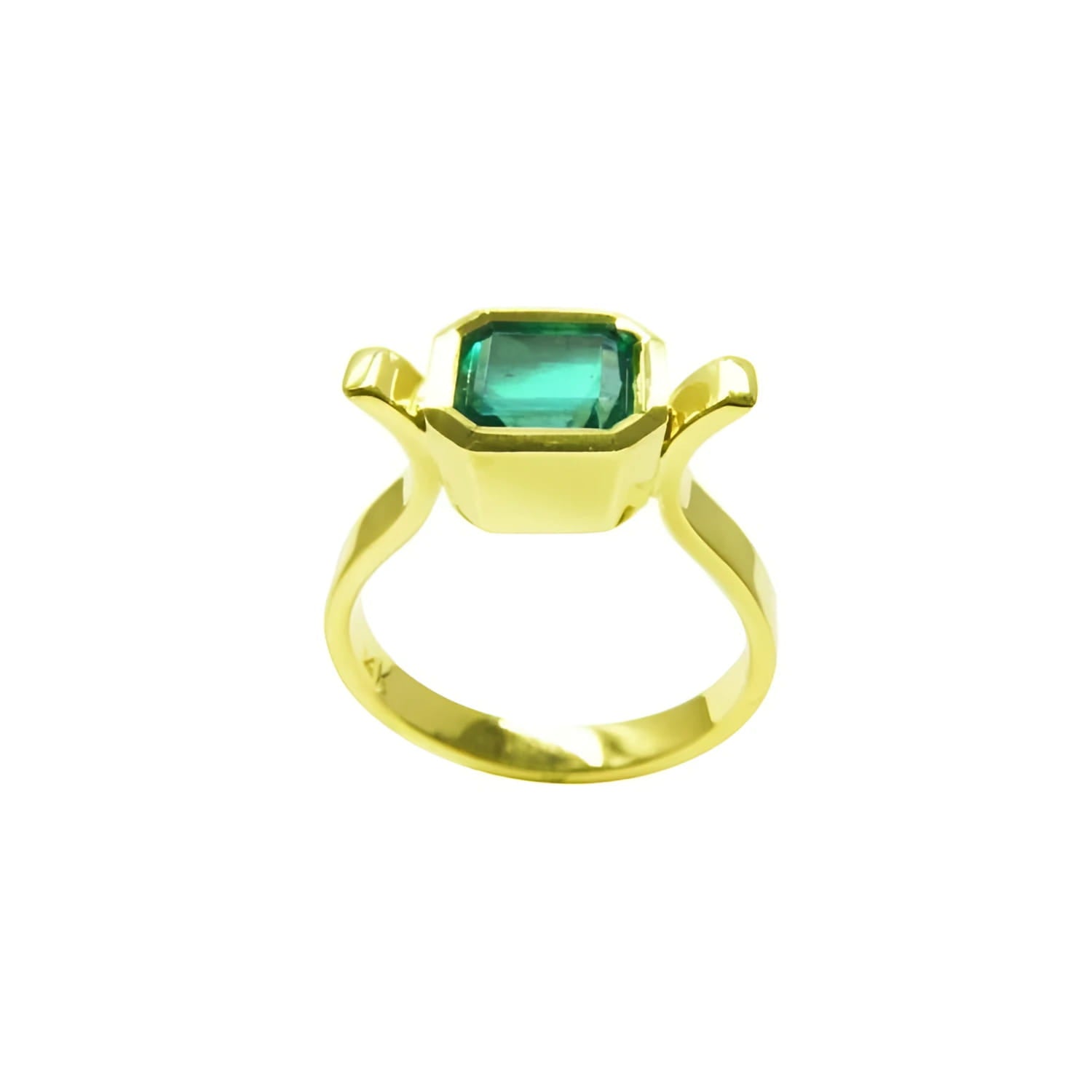 0.93 ct. solitaire Colombian emerald ring in 14K yellow gold, featuring a bezel-set emerald cut stone.