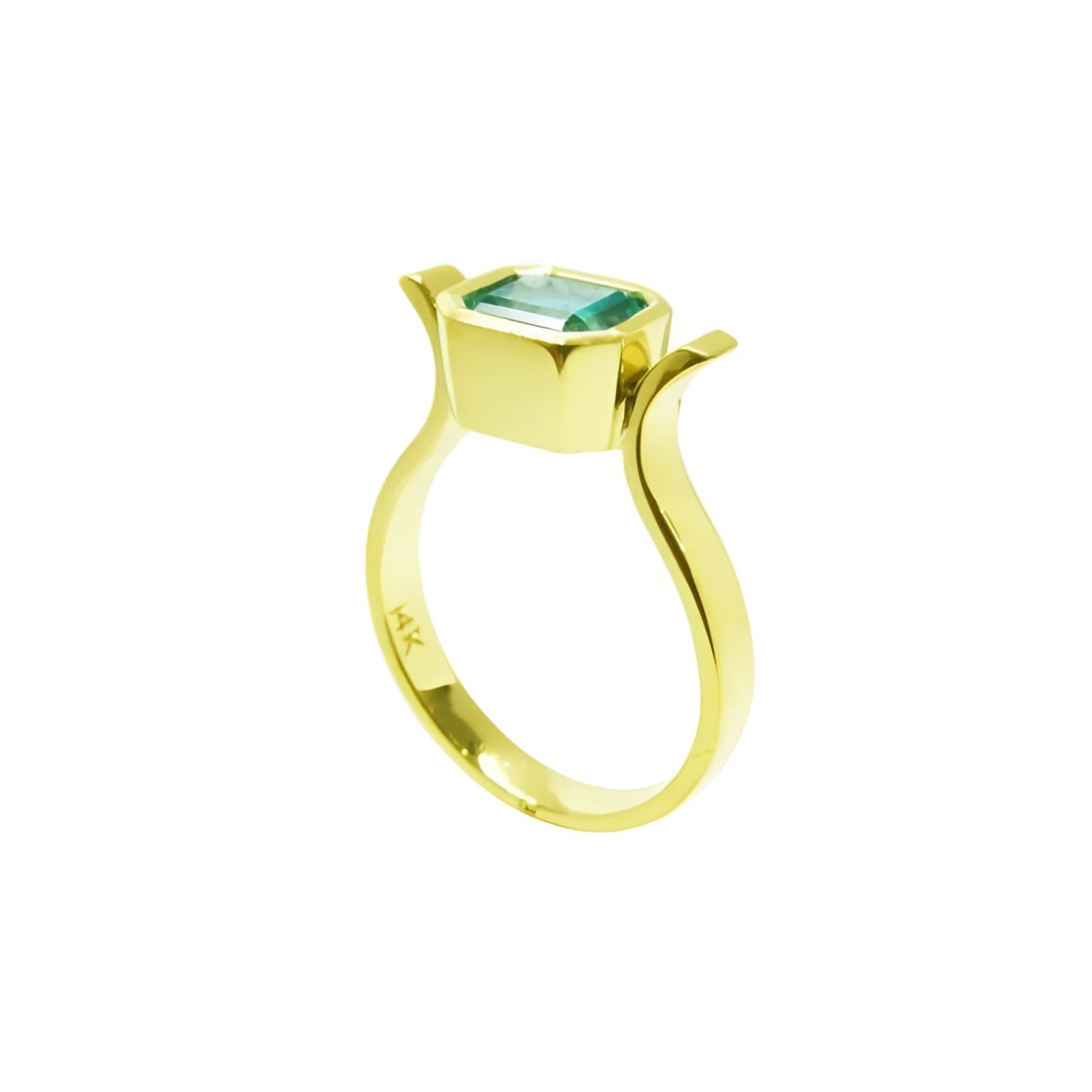 14K yellow gold solitaire ring with a bezel-set emerald-cut Colombian emerald.