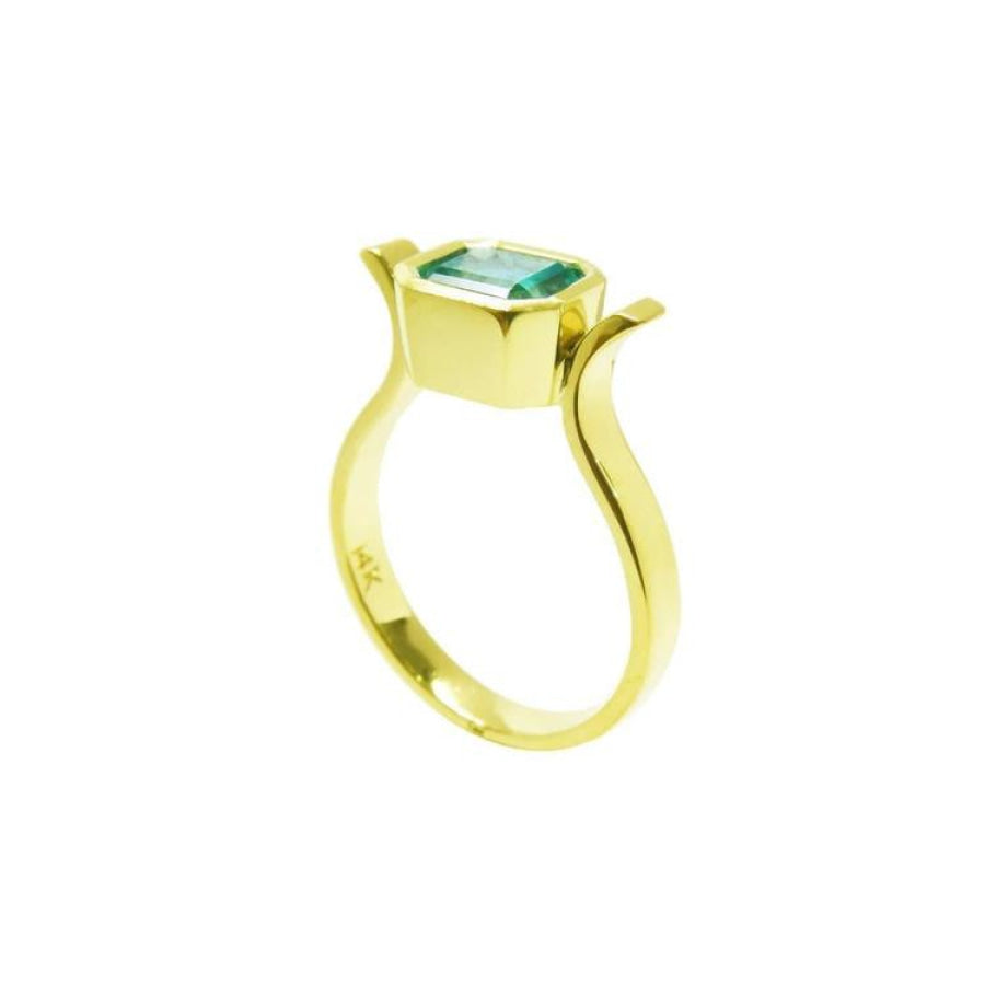 14K yellow gold solitaire ring with a bezel-set emerald-cut Colombian emerald.