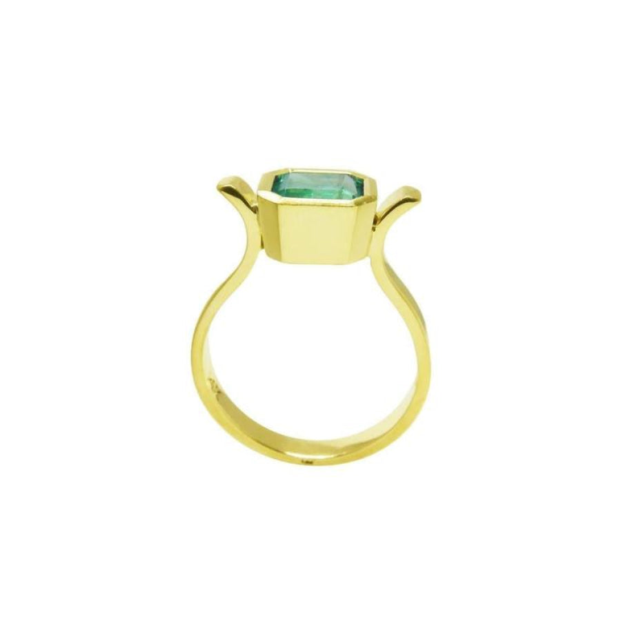 0.93 ct. solitaire Colombian emerald ring in 14K yellow gold, featuring a bezel-set emerald cut stone.