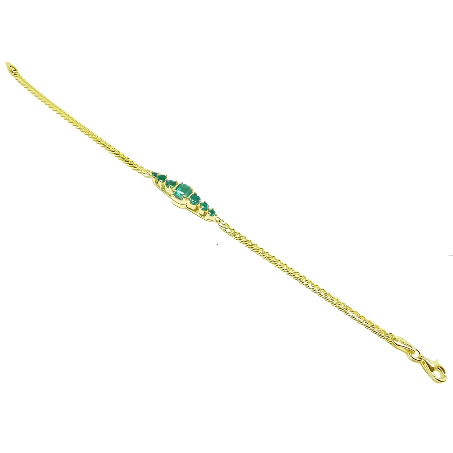Women's 14K yellow gold bracelet with sparkling medium deep green Colombian emeralds.