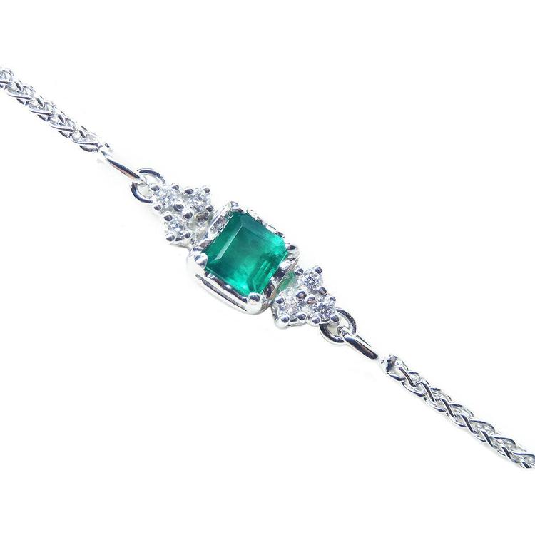 14k white gold bracelet with a square natural colombian emerald and accent diamonds.
