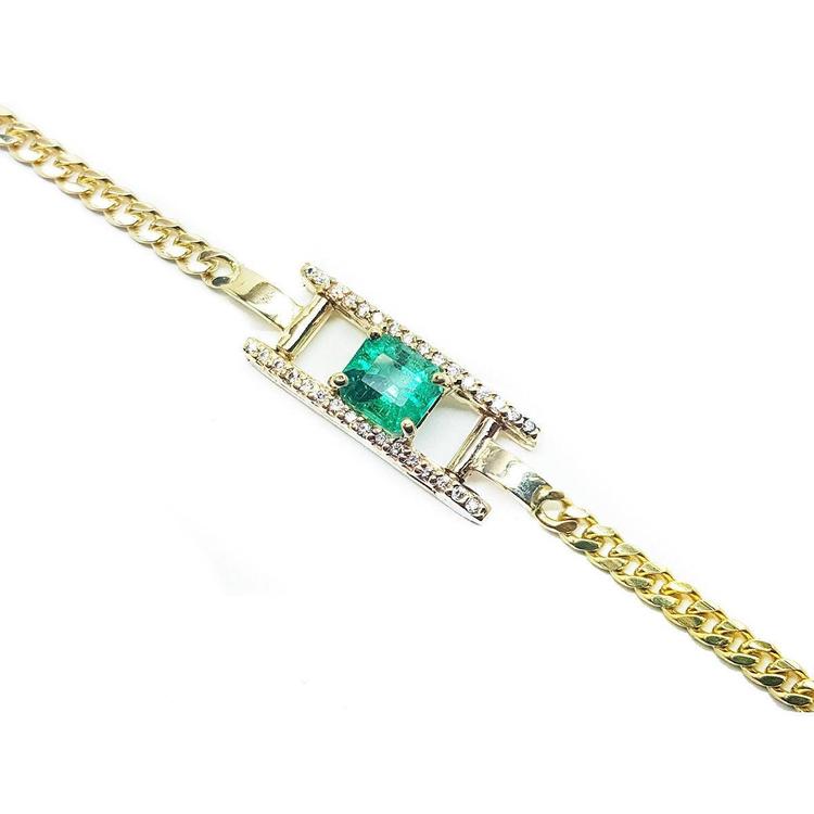 A 14k gold bracelet with a genuine square colombian emerald with diamonds accent.