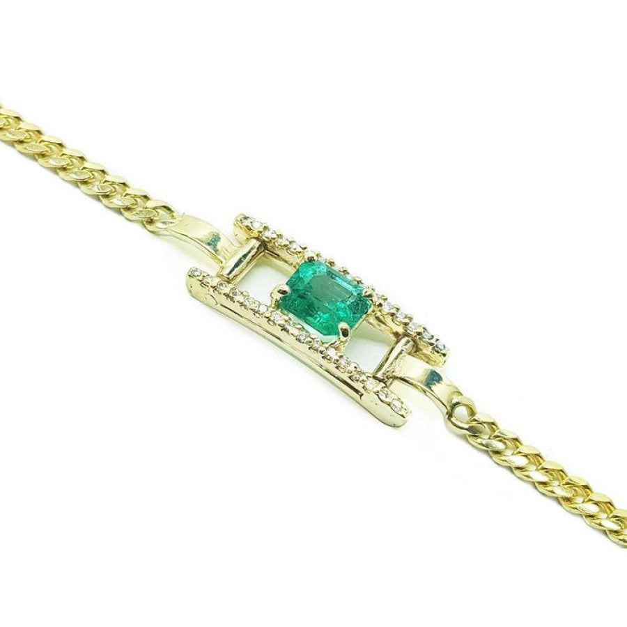 14K yellow gold bracelet with a central emerald-cut Colombian emerald and diamond accents.