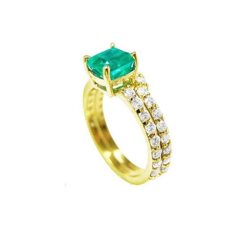 1.39 carat emerald bridal ring set with matching diamond band in 14K gold.