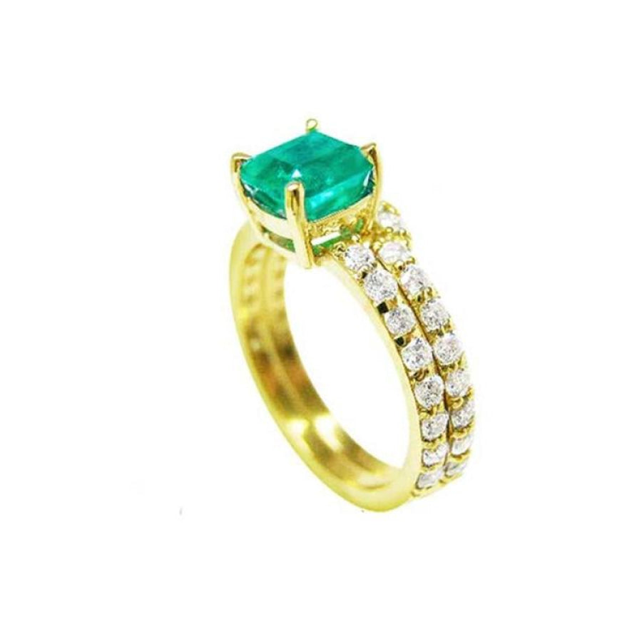 1.39 carat emerald bridal ring set with matching diamond band in 14K gold.