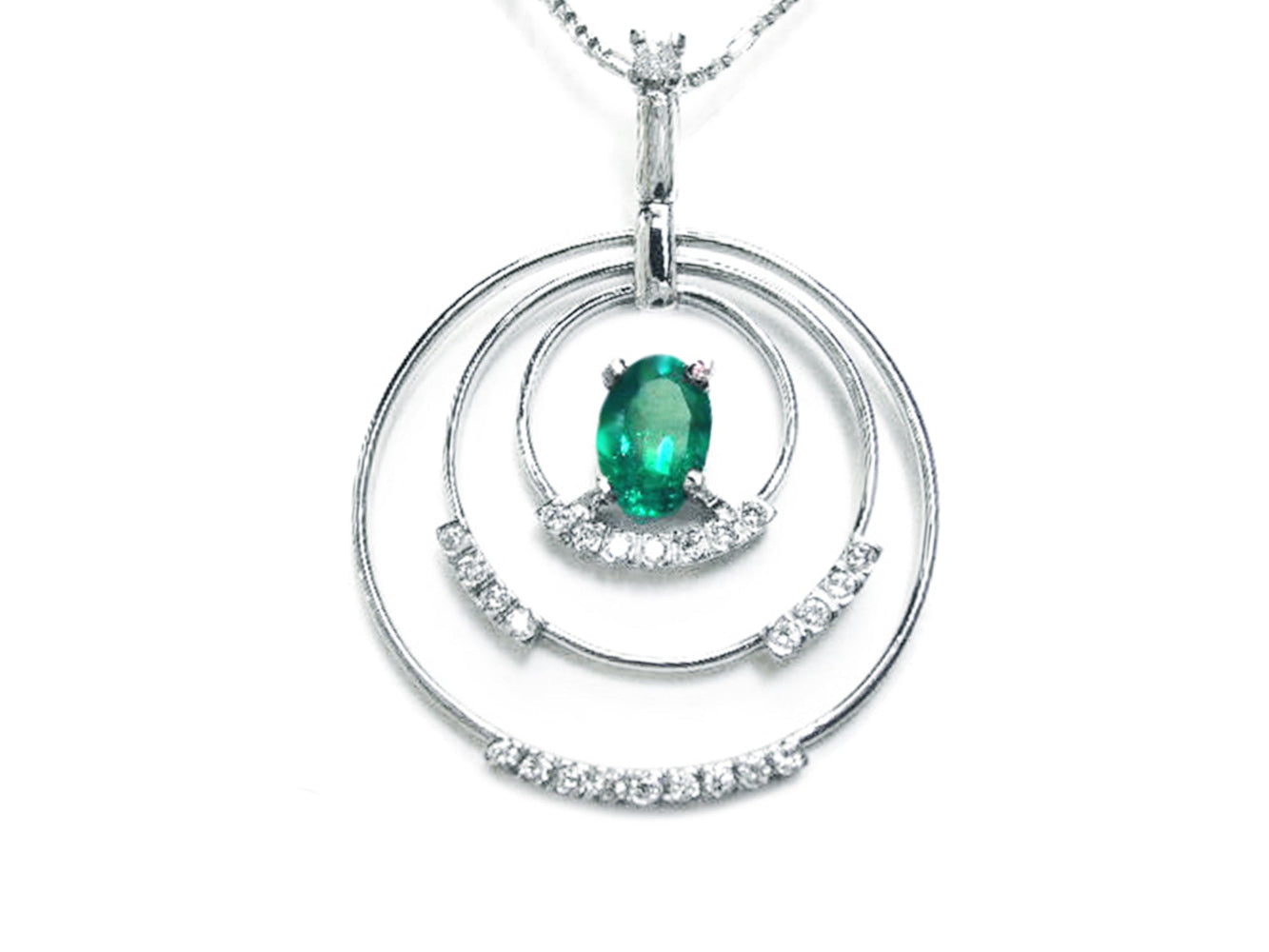 A frontside view of a triple circle of life pendant adorned with natural diamonds, in the center an oval cut colombian emerald.