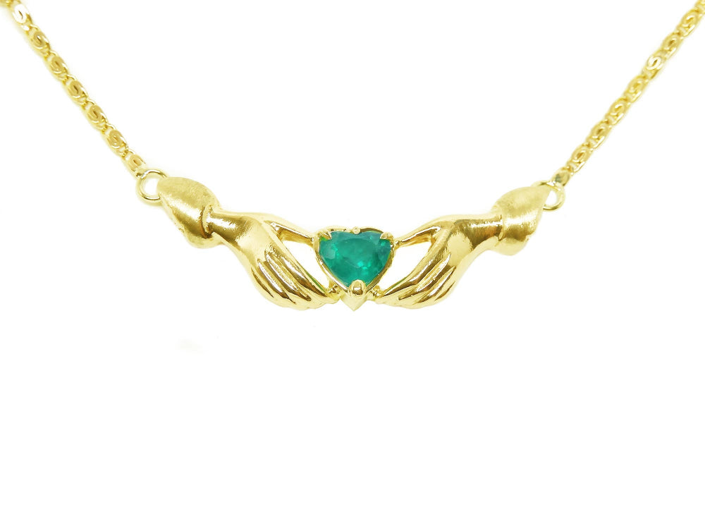 Hearth cut emerald claddagh necklace natural Colombian deep green color Muzo mines crafted in 14k yellow gold