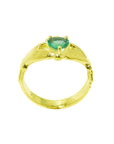 A pear shaped natural colombian emerald claddagh ring for ladies.