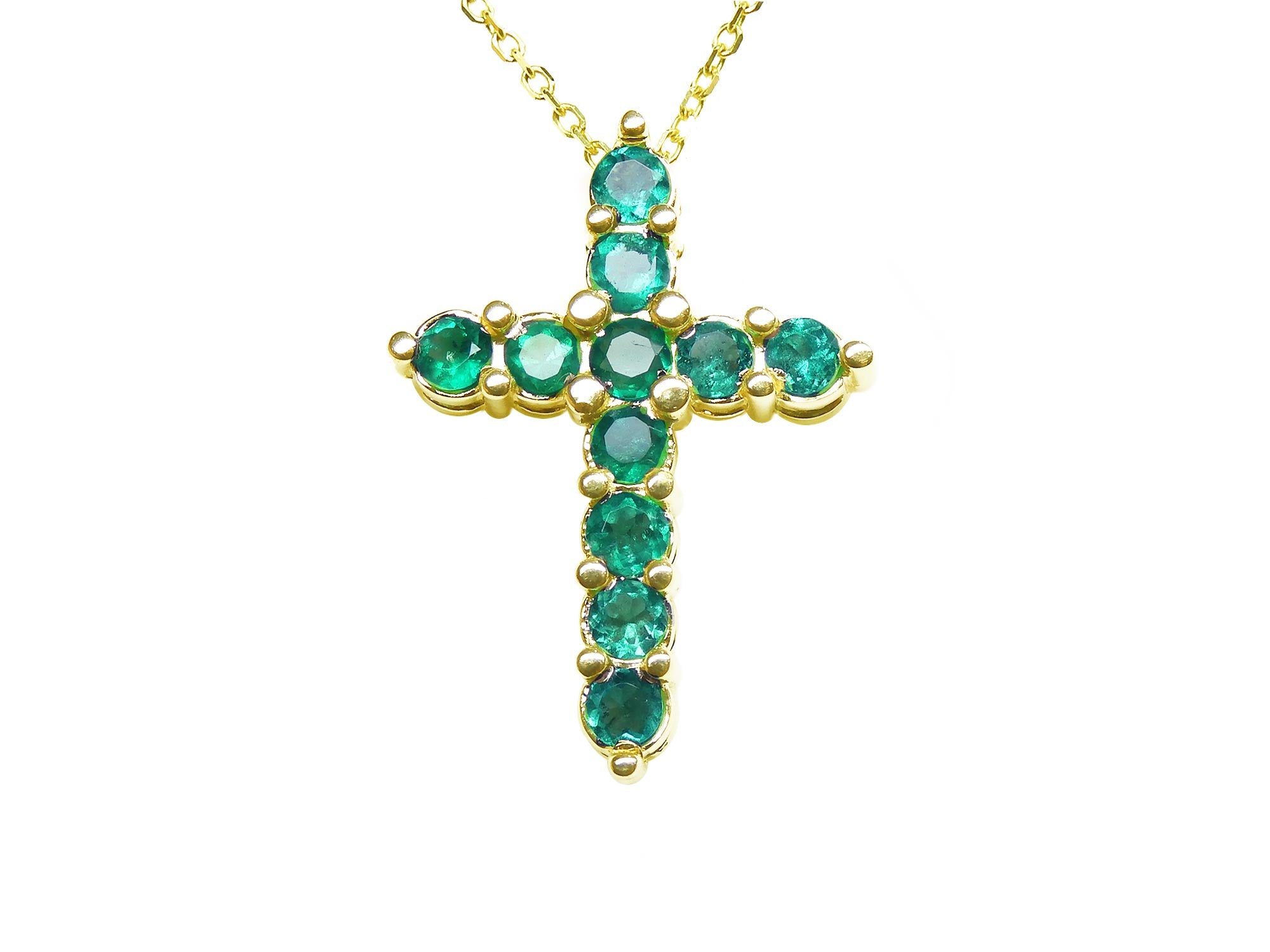 Colombian emerald cross pendant necklace, top view front position.