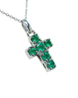 Emerald cross pendant necklace round-cut natural Colombian emeralds in an individual prong setting.