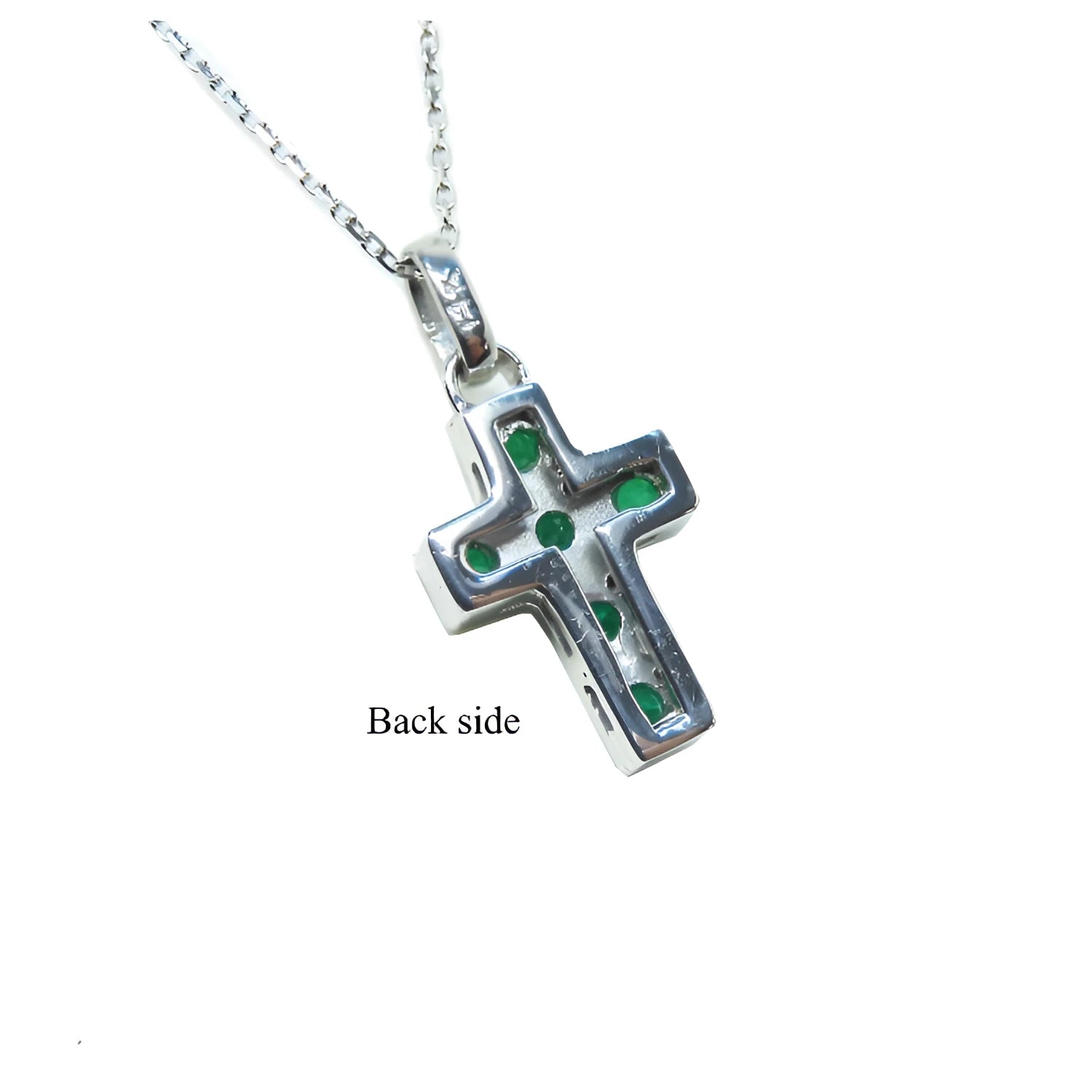 Emerald cross pendant necklace o the back side view.