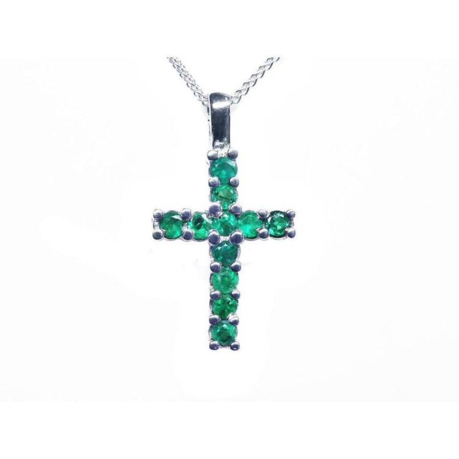 18K white gold cross pendant necklace with 0.55 ct. round-cut emeralds, prong set on a delicate chain.