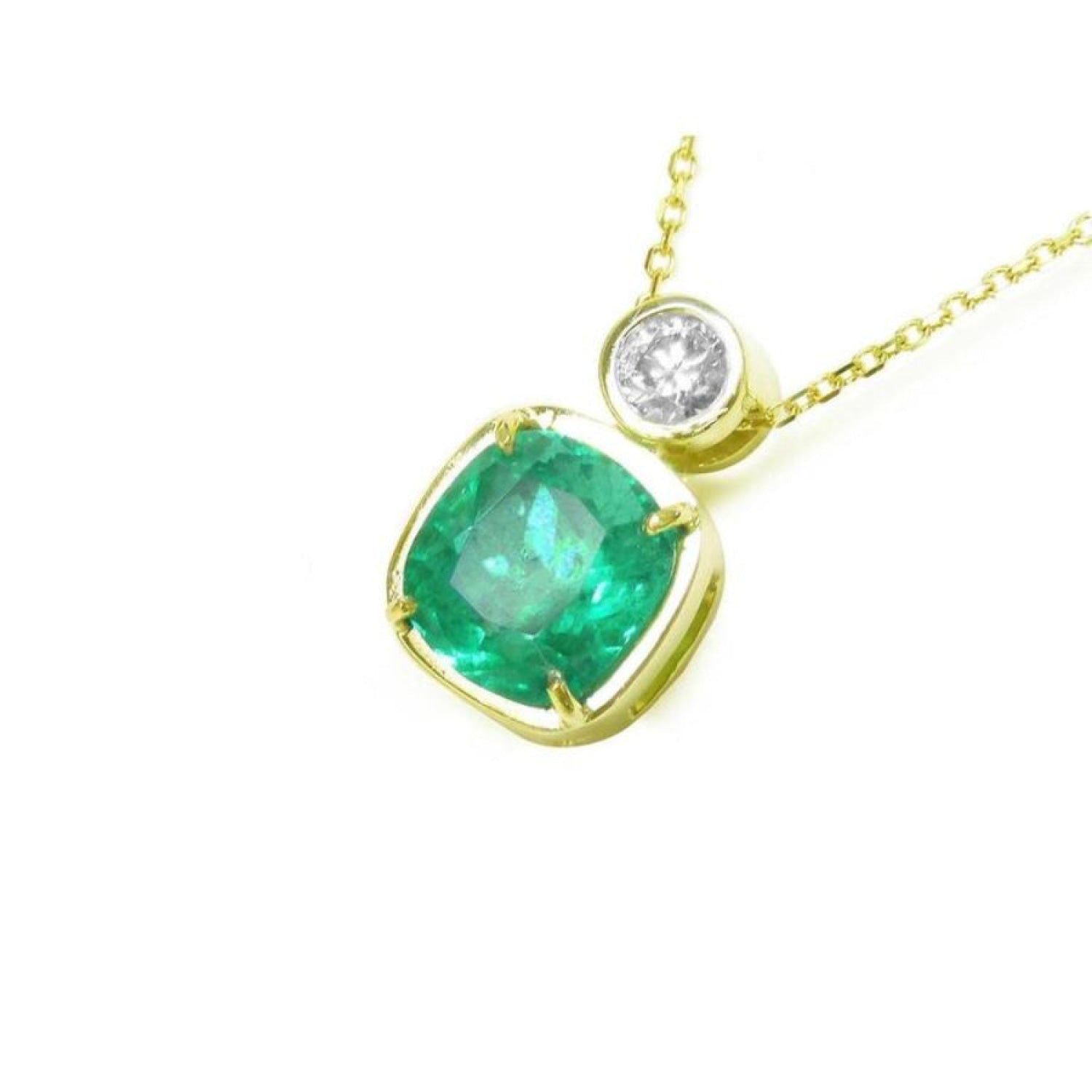 3.43 ct. cushion cut emerald pendant with a round diamond accent in 18K yellow gold.