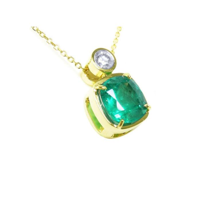 Right side profile of a cushion cut emerald pendant necklace, top and gallery view.