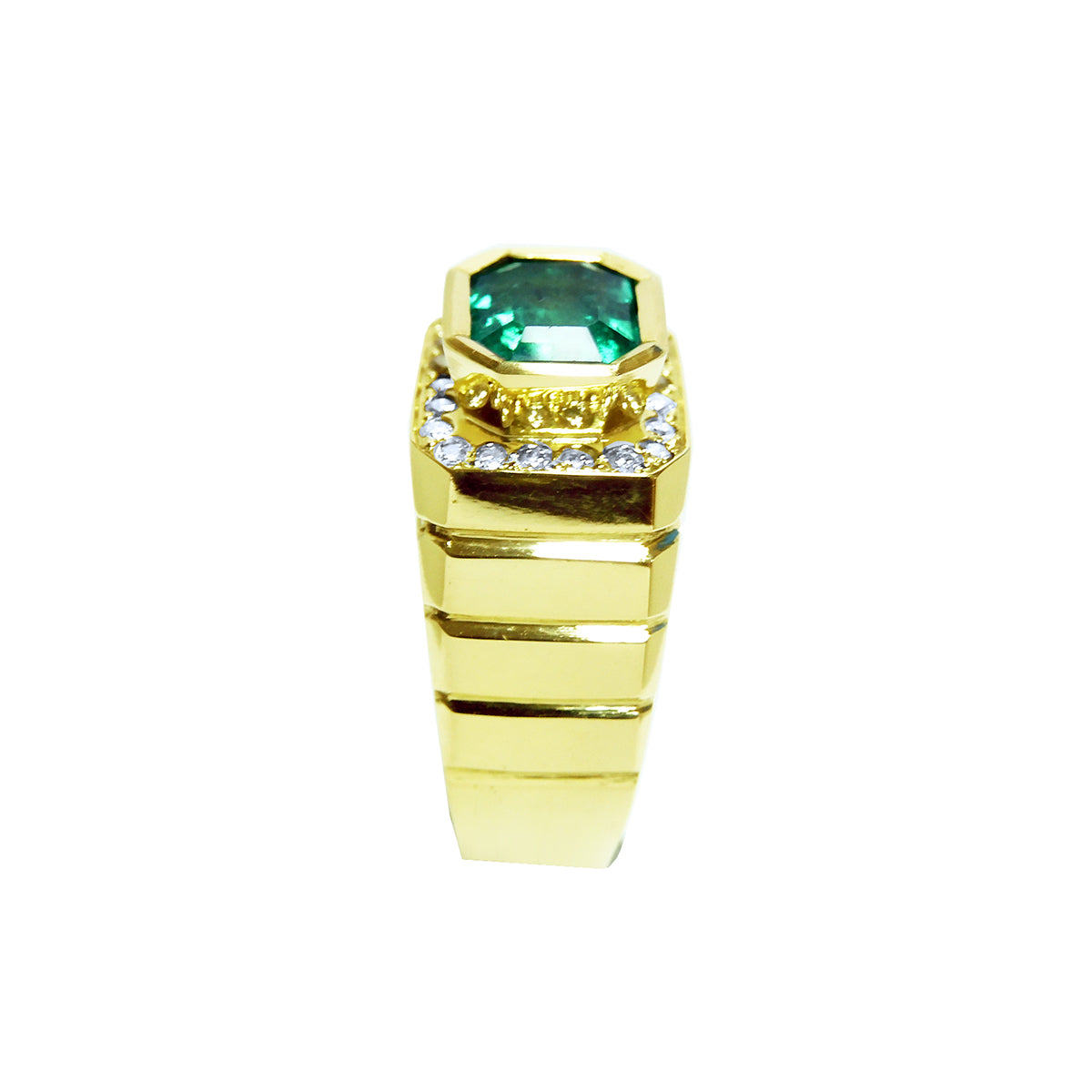 This men&#39;s emerald ring displays its top setting and side profile band design.
