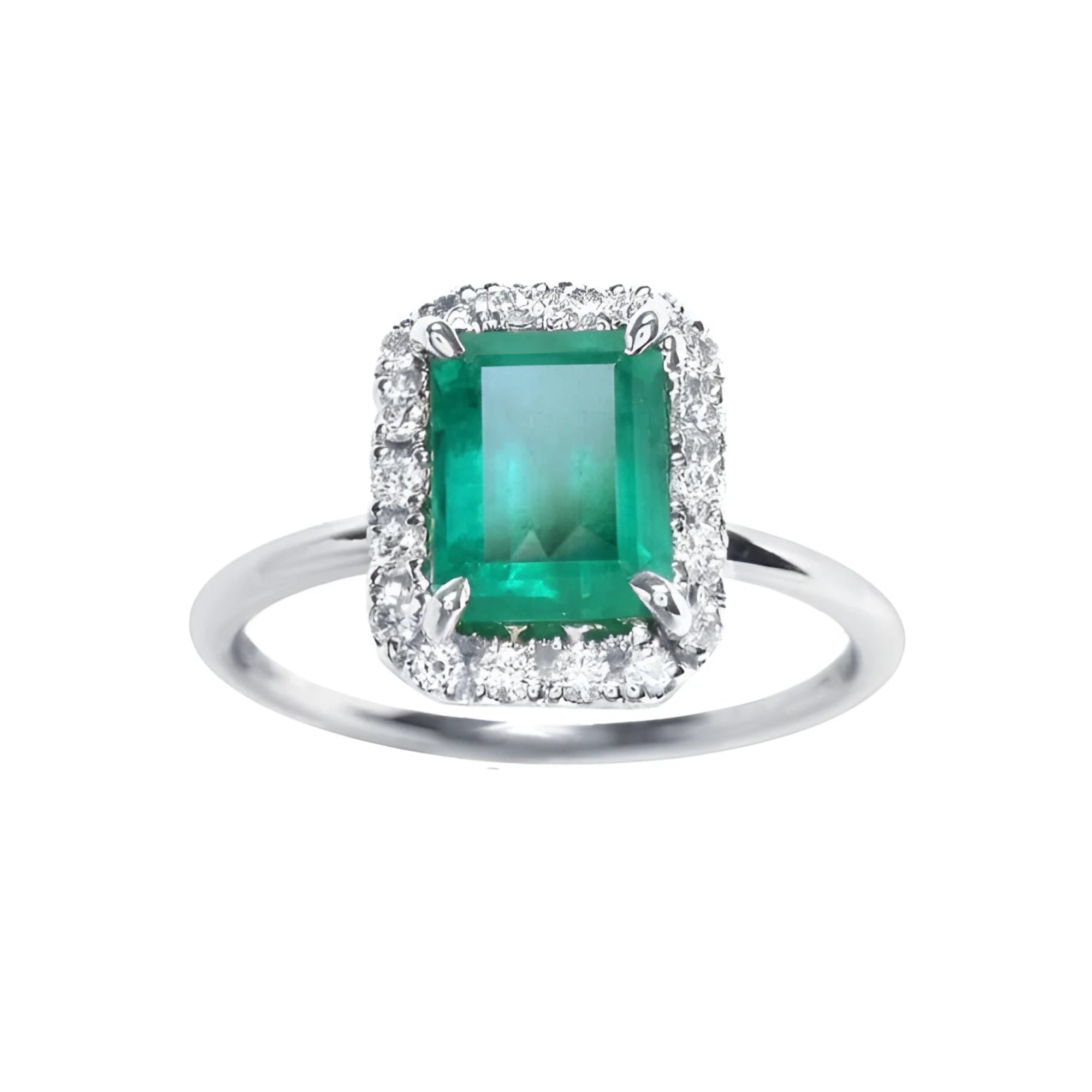 A rectangular emerald-cut encircled by a halo natural diamond emerald ring in 14k white gold.