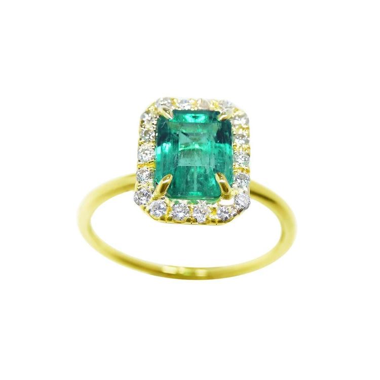 1.69 ct emerald-cut Colombian emerald halo diamond ring in 14K yellow gold.