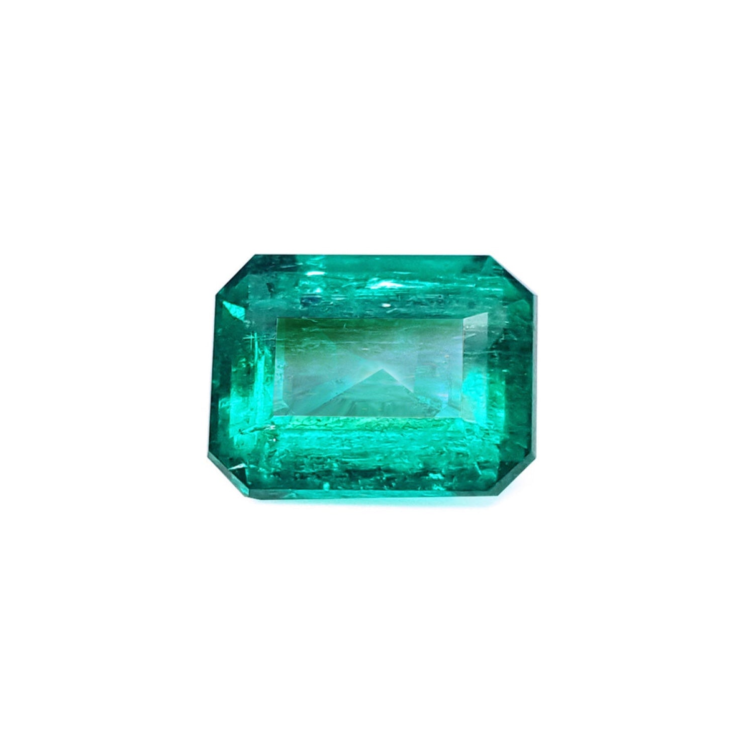 Certified loose Colombian emerald emerald-cut sourced from the Muzo mines.