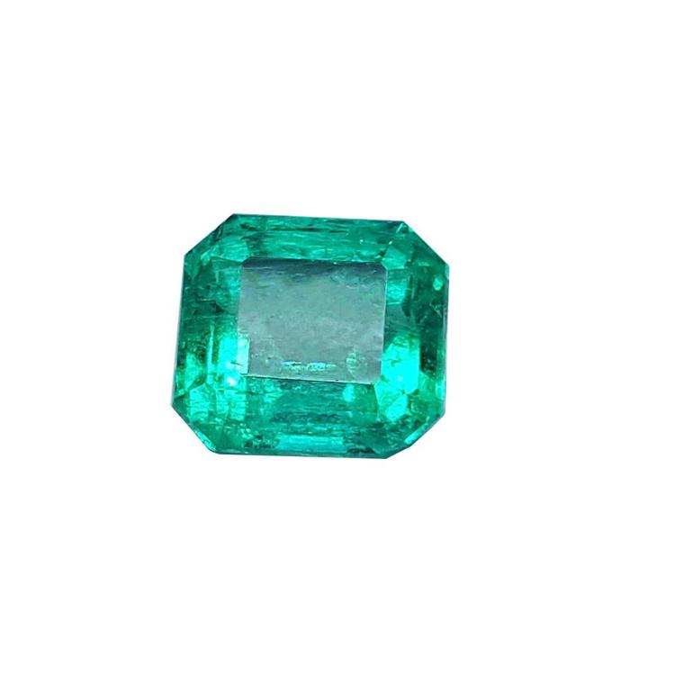 Emerald-cut Muzo Colombian loose emerald, sparkling medium bluish green color for a unique design of ring.