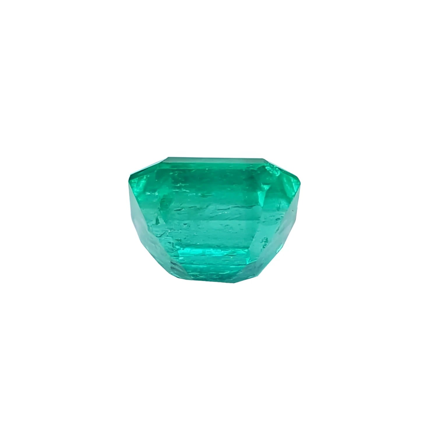 1.55 carat emerald-cut Muzo Colombian loose emerald, sparkling medium bluish green.