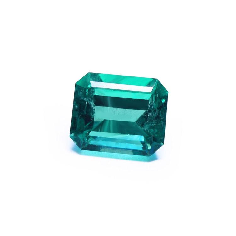 Gia certified emerald-cut loose Colombian emerald front view displaying crown and table