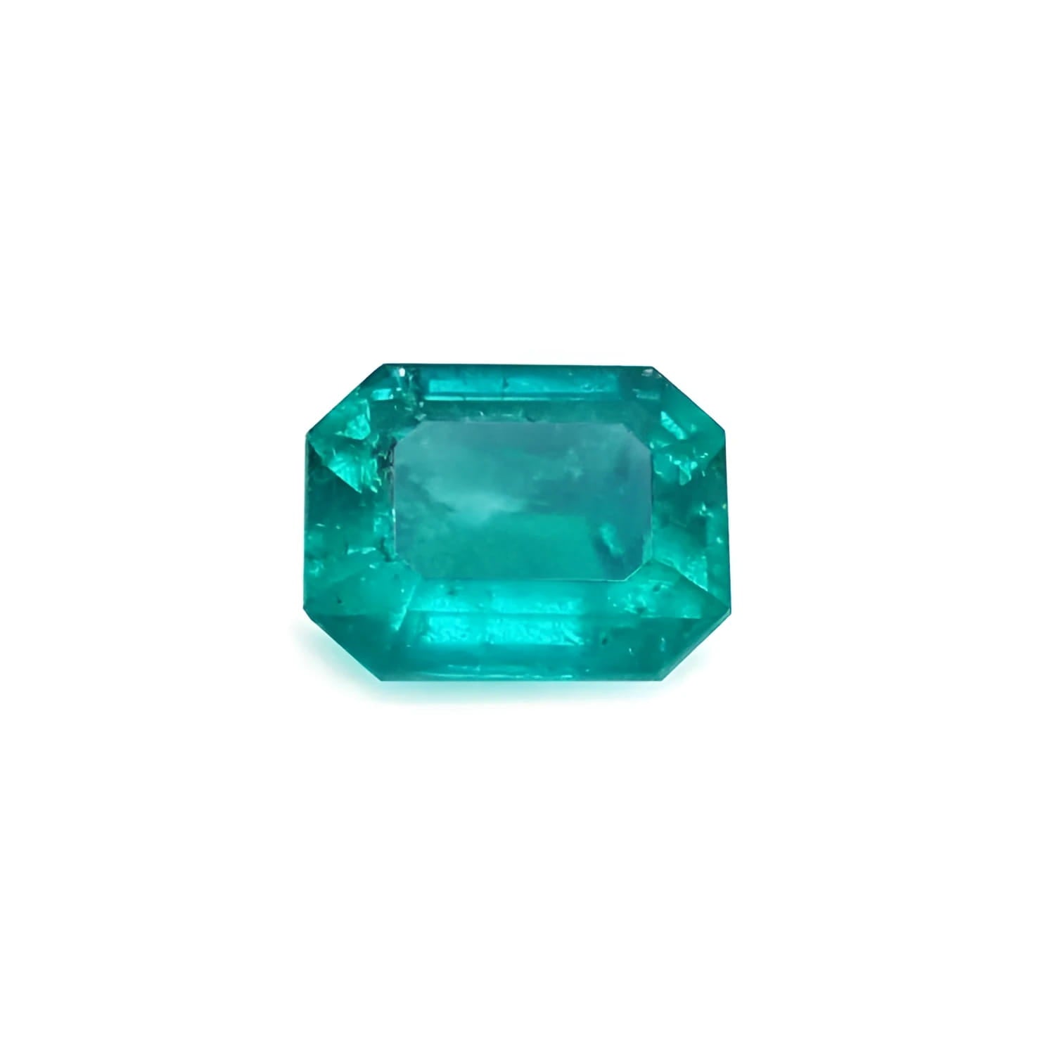 Emerald-cut loose Muzo colombian emerald 1.57 ct.  sparkling medium bluish green hue rectangular emerald cut.