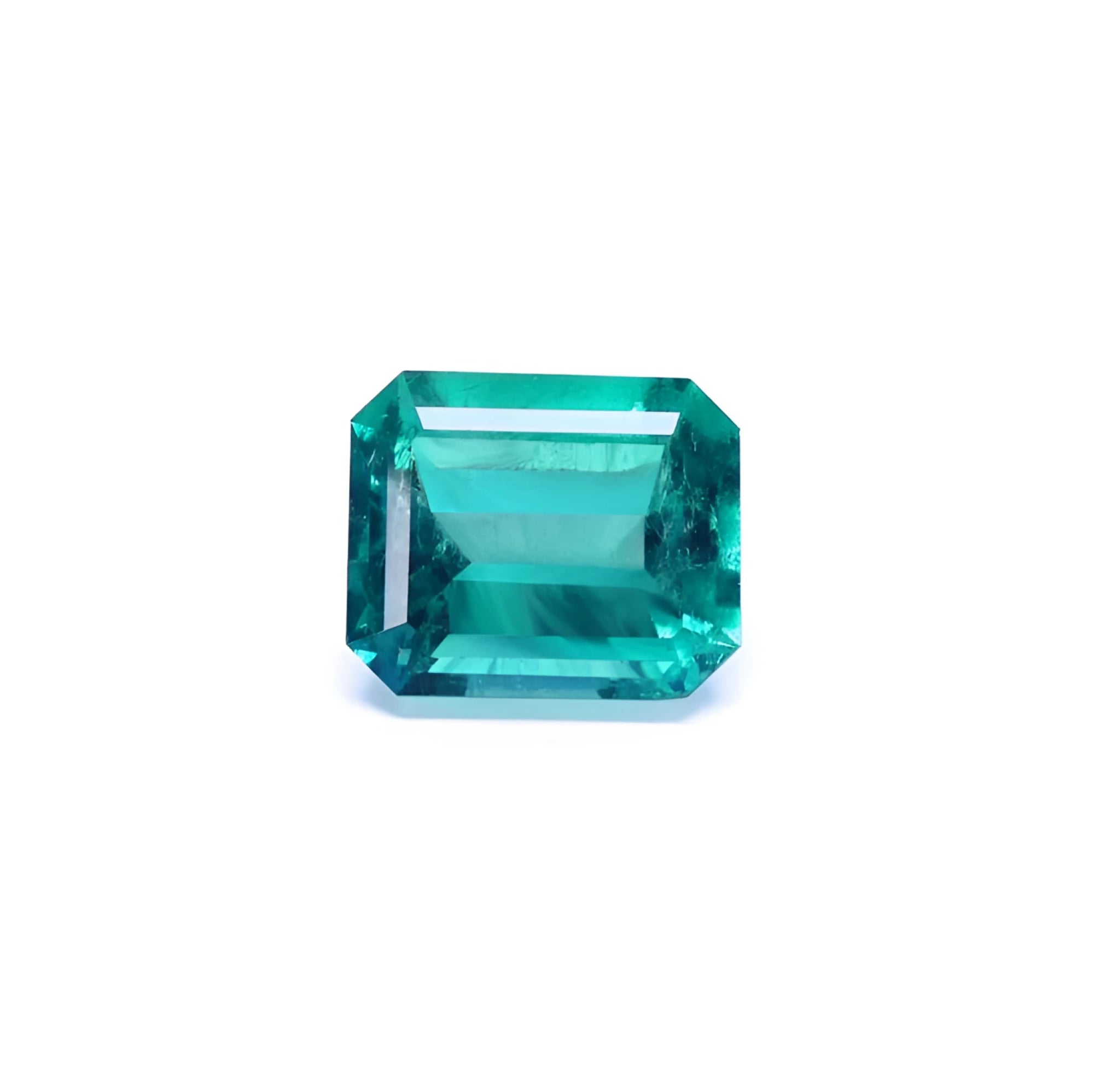 GIA certified 3.03 ct emerald-cut Colombian emerald with a medium-deep bluish-green color.