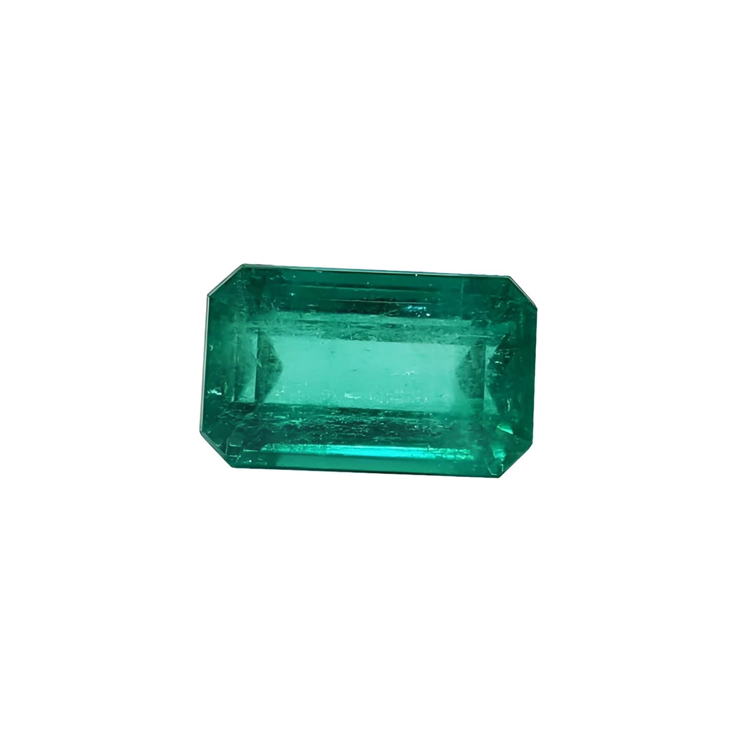 Emerald-cut natural loose colombian emerald, features a medium deep green hue and a rectangular emerald cut.