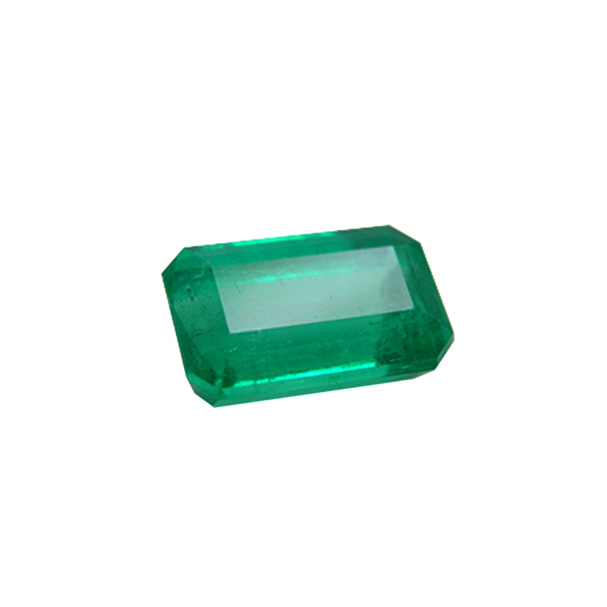 Emerald-cut natural loose colombian emerald, right high position table and crown visibles