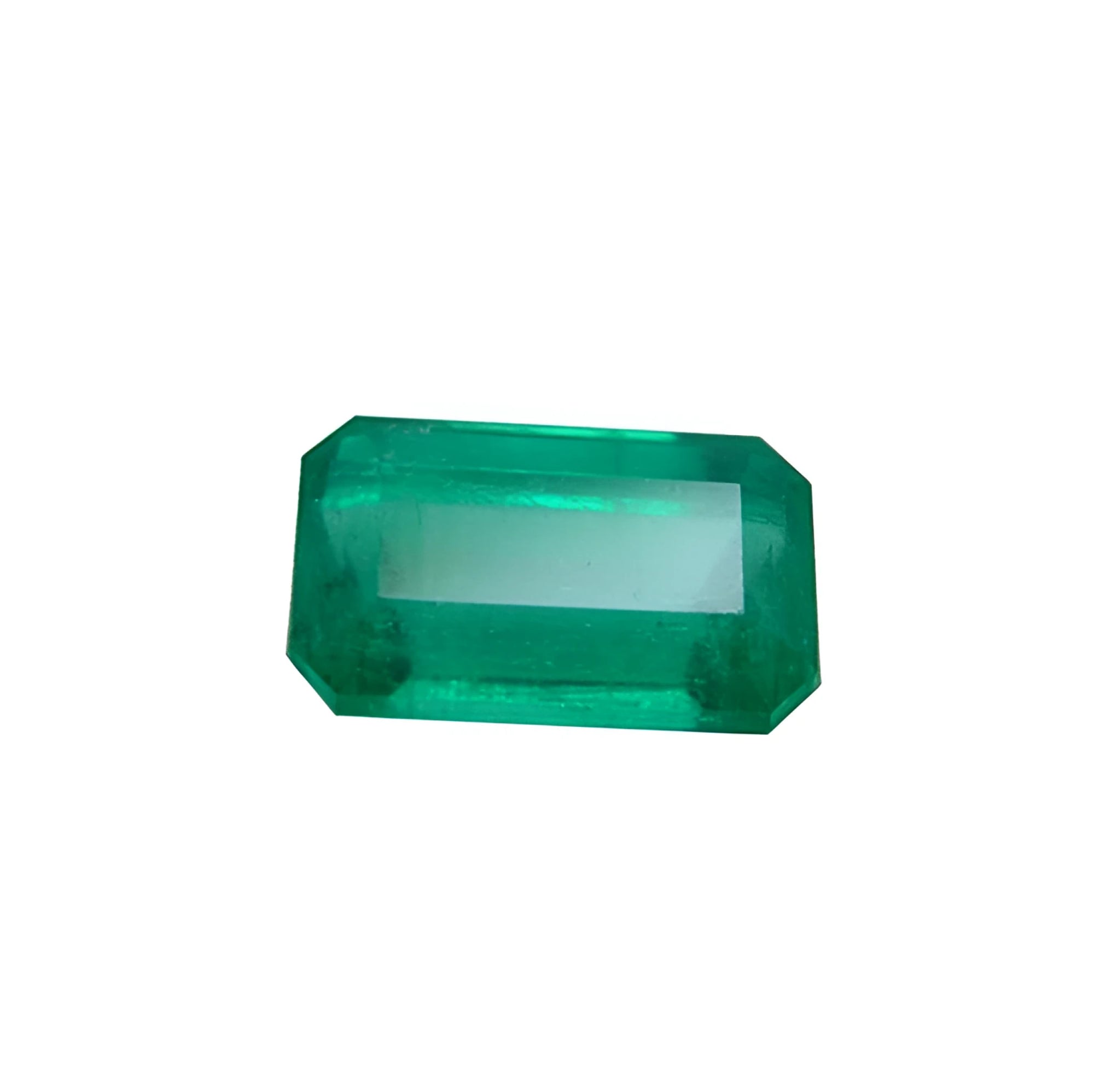 2.55 carat loose natural Colombian emerald with a medium deep green hue and rectangular emerald cut.