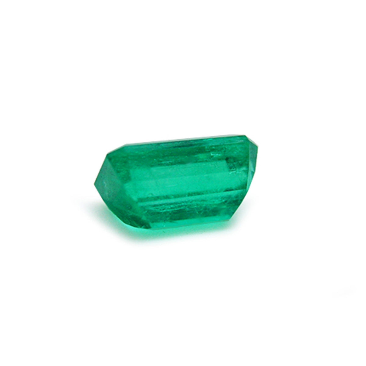 Emerald-cut natural loose colombian emerald, underside girdle and pavillon visibles