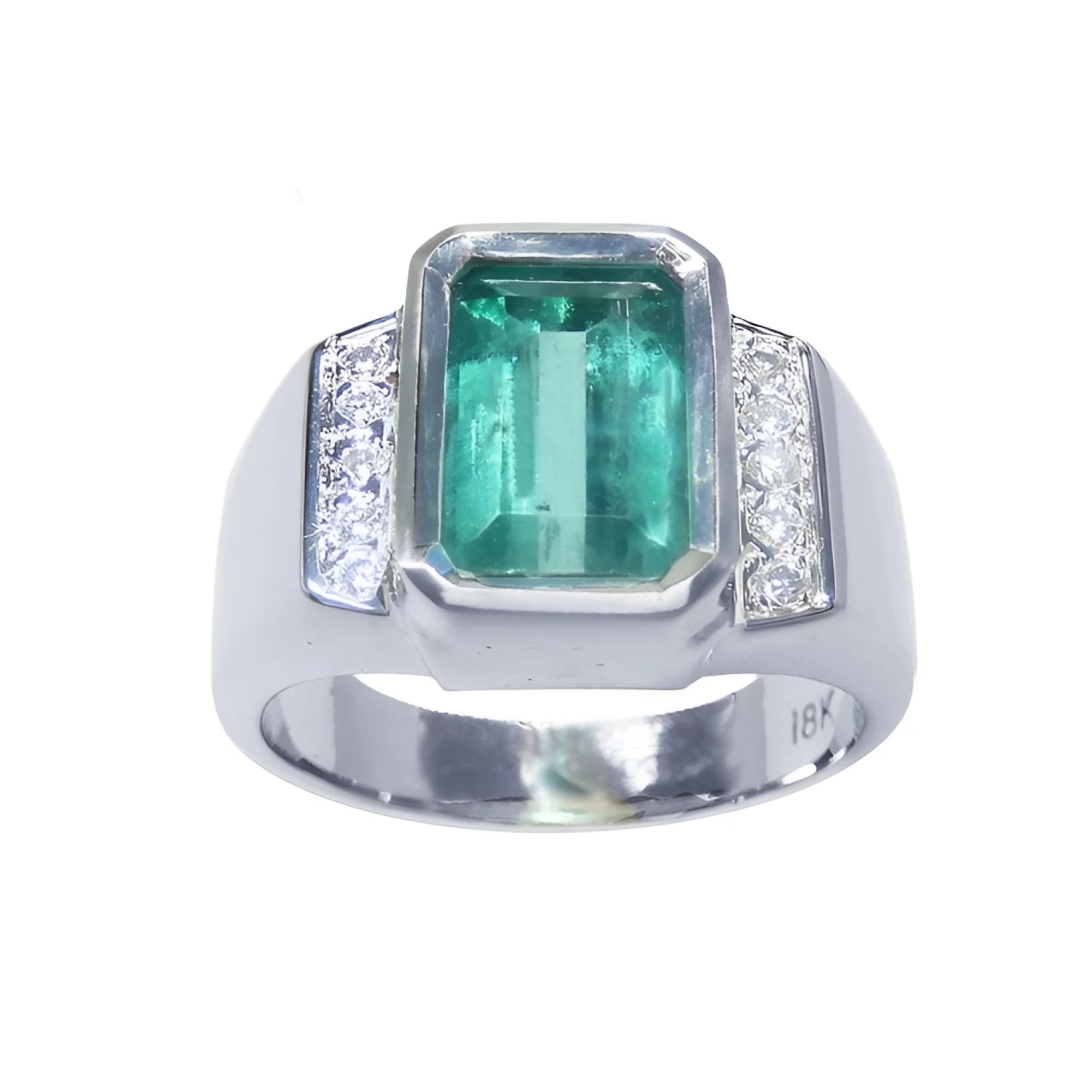 A 18k white gold mens ring with an emerald cut natural colombian emerald bezel set and diamond accents.
