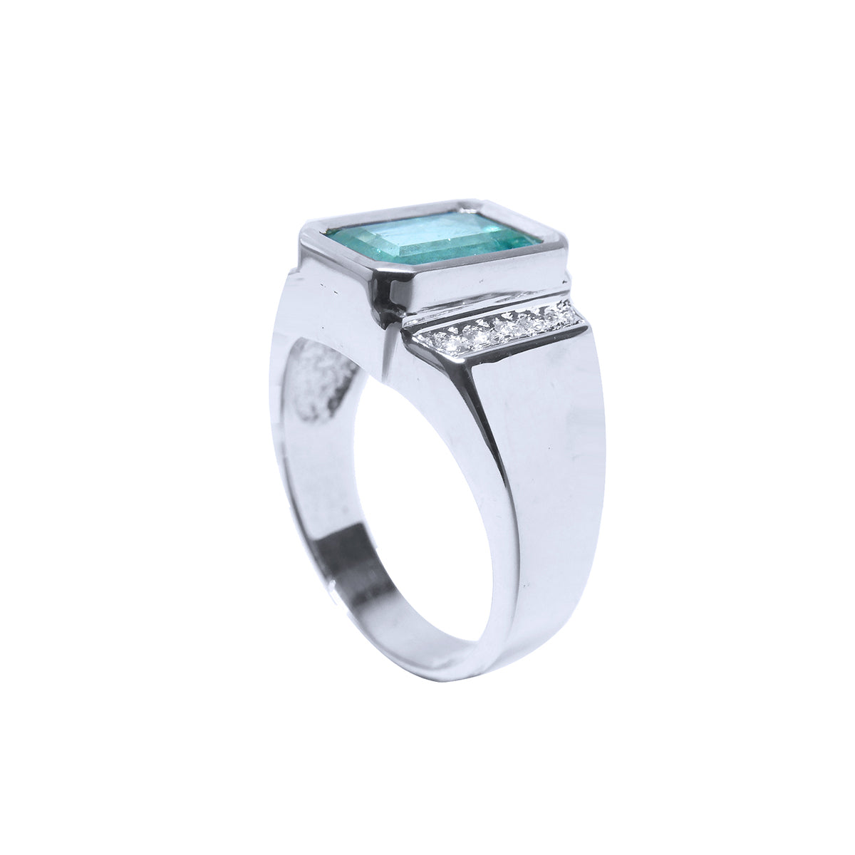A white gold ring for men with a rectangular emerald and accent diamonds shows the top setting and side band design.