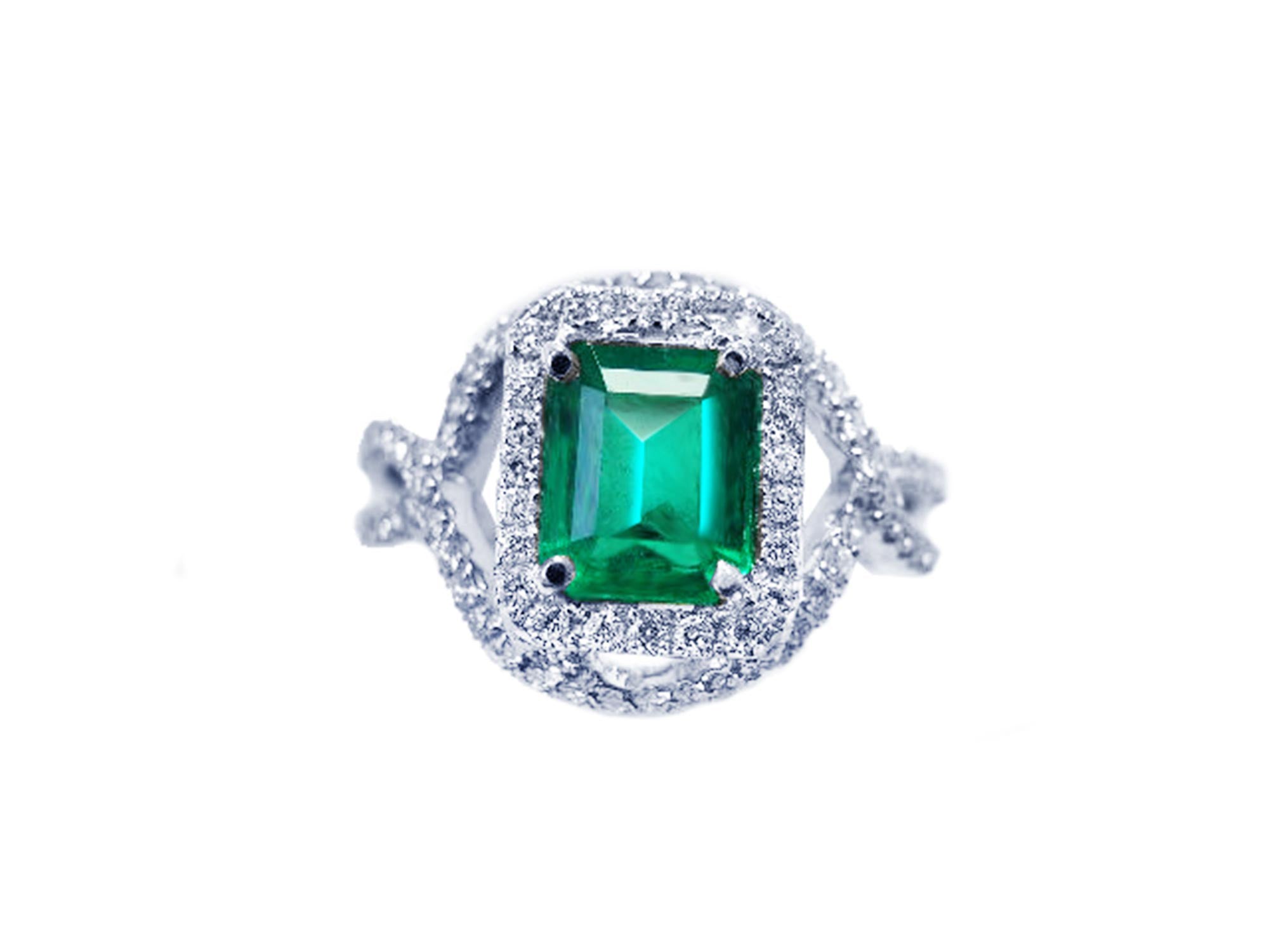 An emerald-cut natural emerald ring full top profile view on a white background.