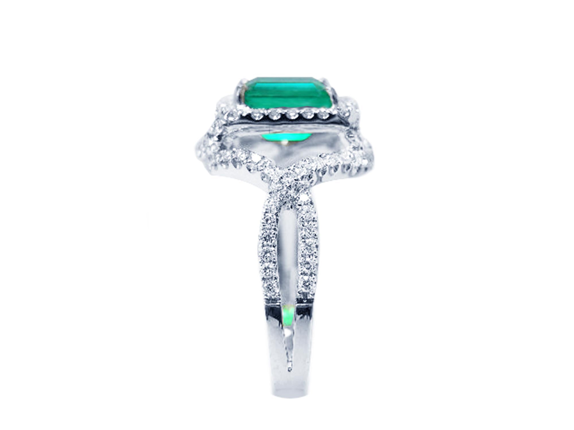 This USA made emerald ring is displaying its top and side band side profile.