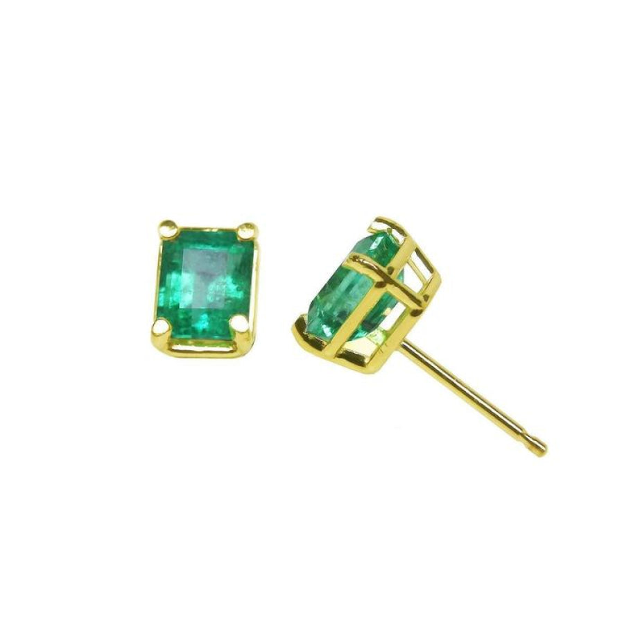 Emerald-cut natural emerald stud earrings, 1.29 ct, set in 14K yellow gold basket settings.