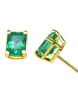 Yellow gold settings emerald-cut natural emerald earrings, top and side view profiles.