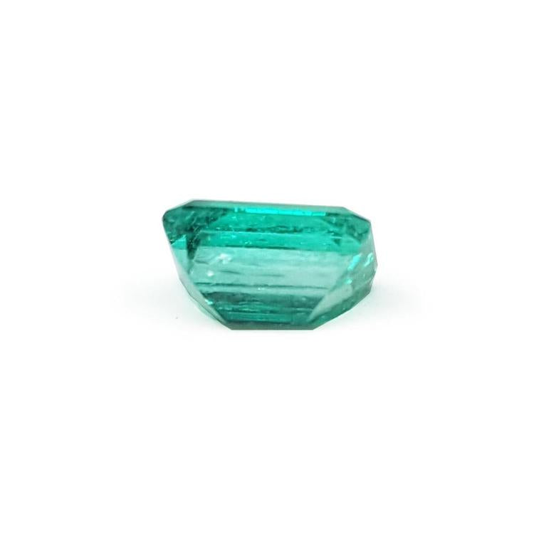 Affordable emerald-cut loose Colombian emerald underneath pavilion view