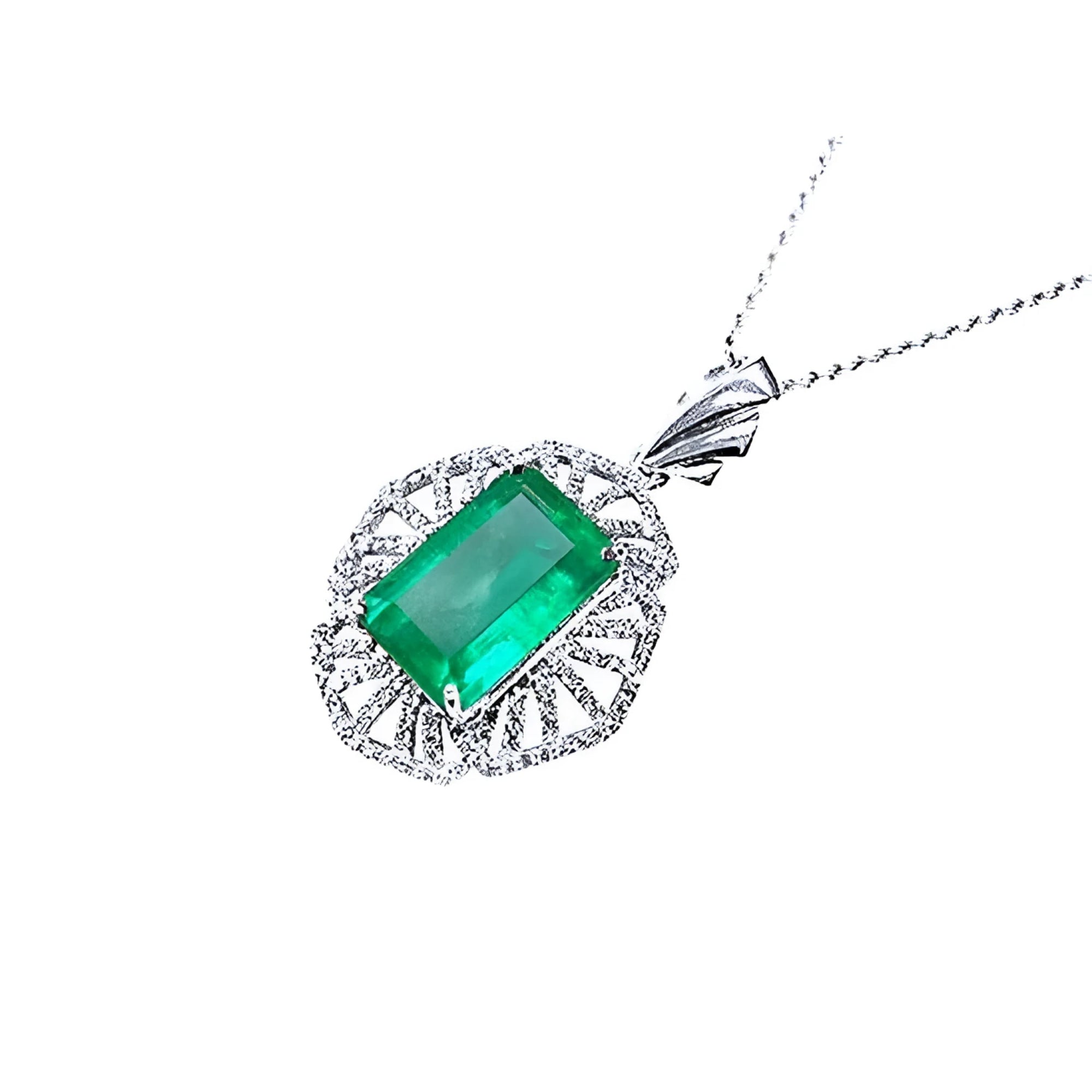 6.19 ct emerald-cut Colombian emerald pendant with natural diamonds in 14K white gold.