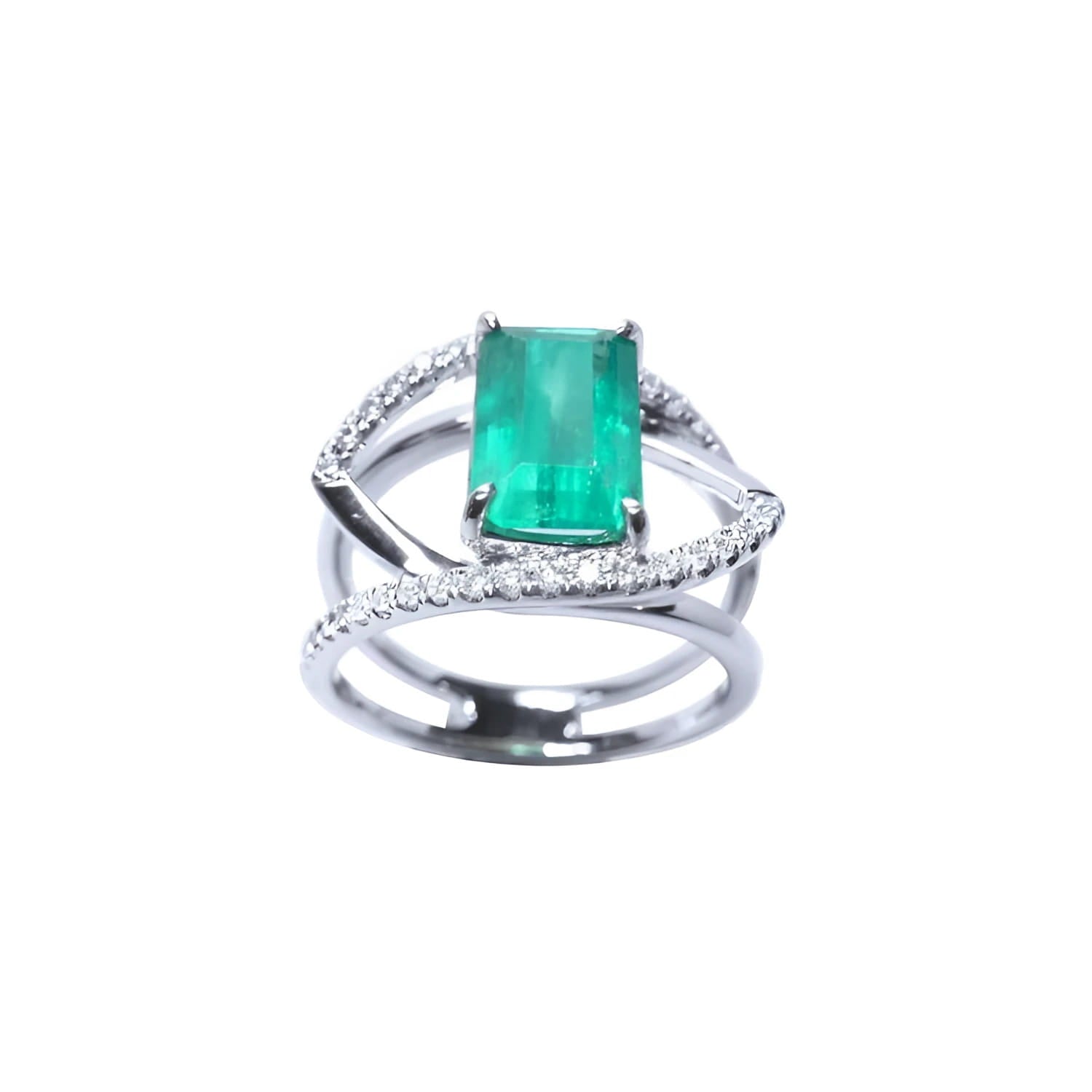 Emerald-cut emerald ring in 14K white gold with split shank and double row of diamonds.