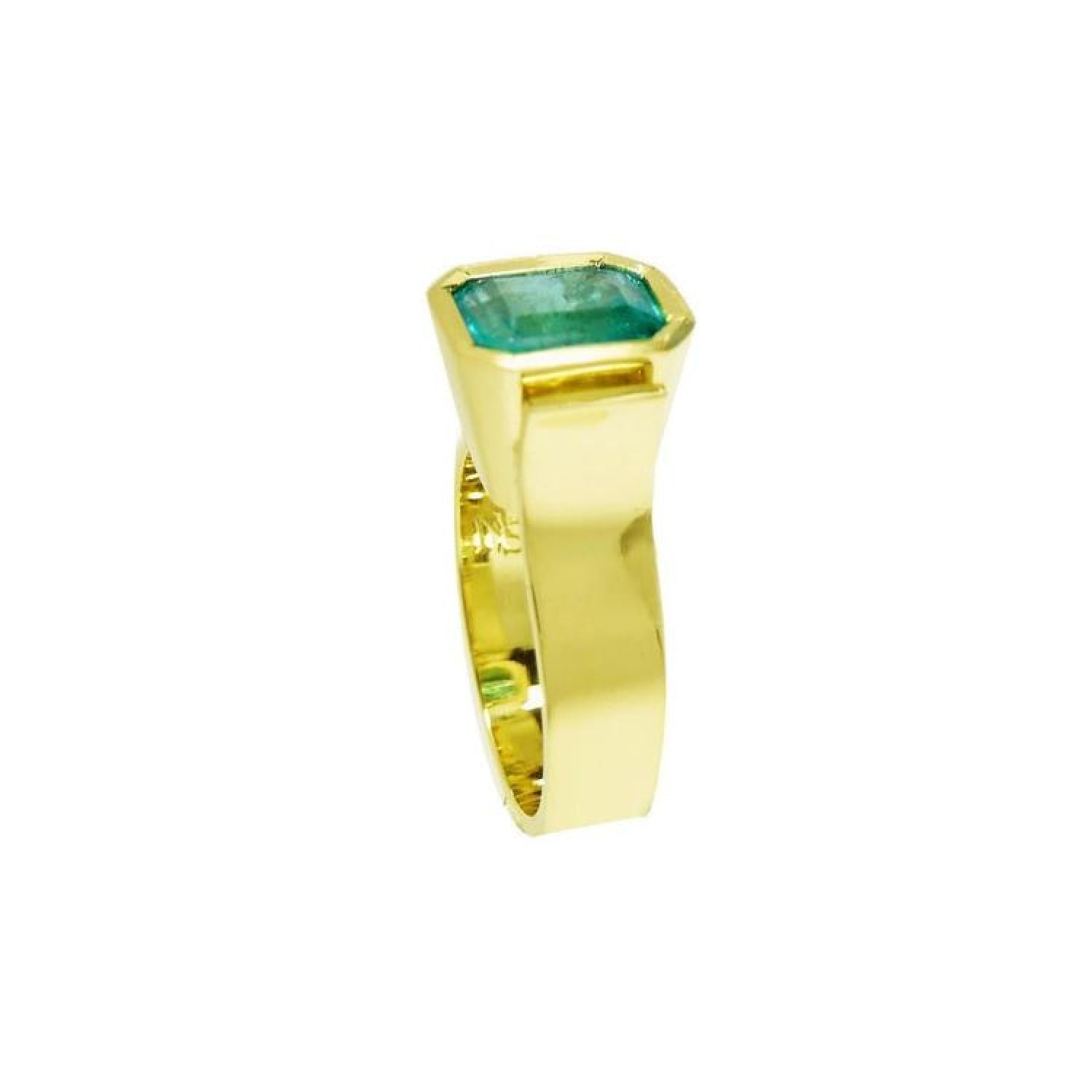 Emerald-cut emerald solitaire ring, bezel set in high polish 14K solid gold.