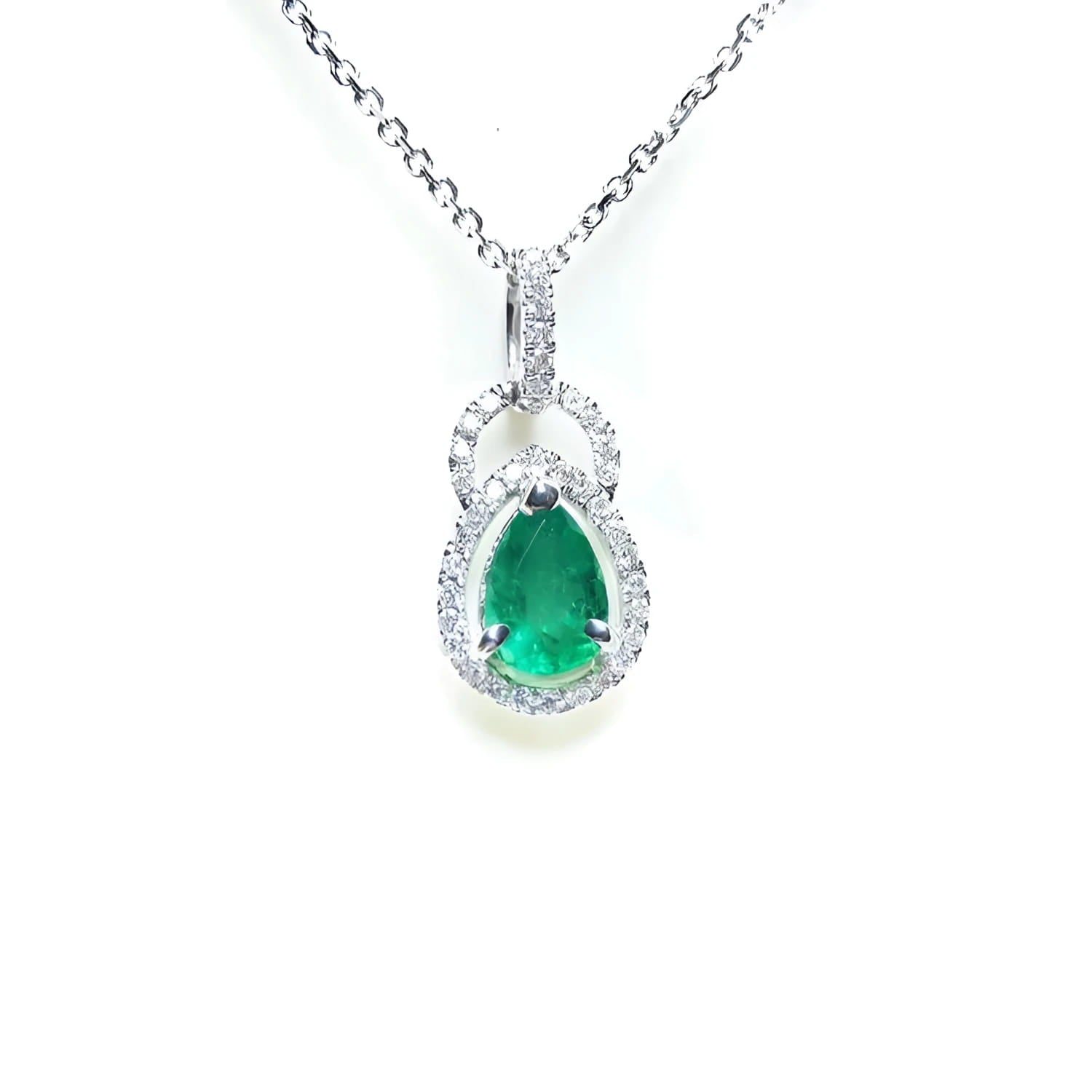 Emerald pendant necklace made of 14k white gold and natural diamonds