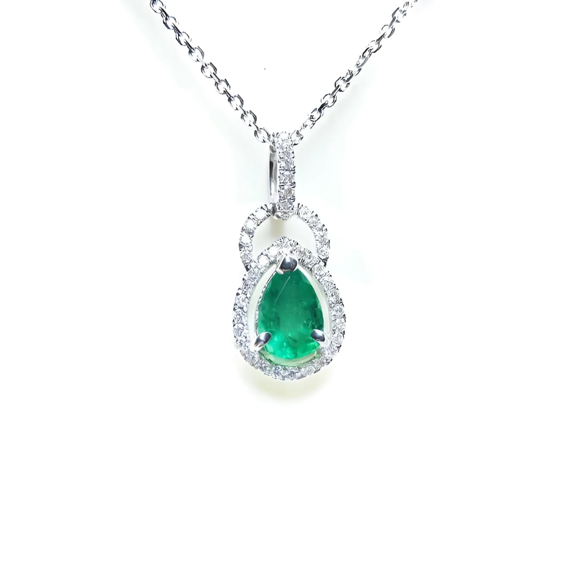 Emerald pendant necklace made of 14k white gold and natural diamonds