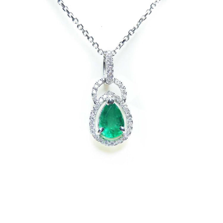 Emerald pendant necklace made of 14k white gold and natural diamonds